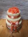 Svatební dort s čokoládovými trubička oranžový