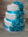 Svatební dort modrý s růžemi